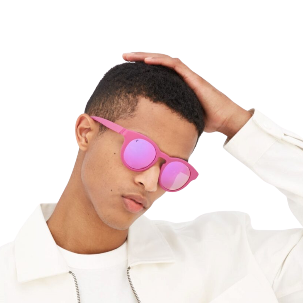 K-WAY Blisse fuchsia sunglasses worn, showcasing fit and bold style statement