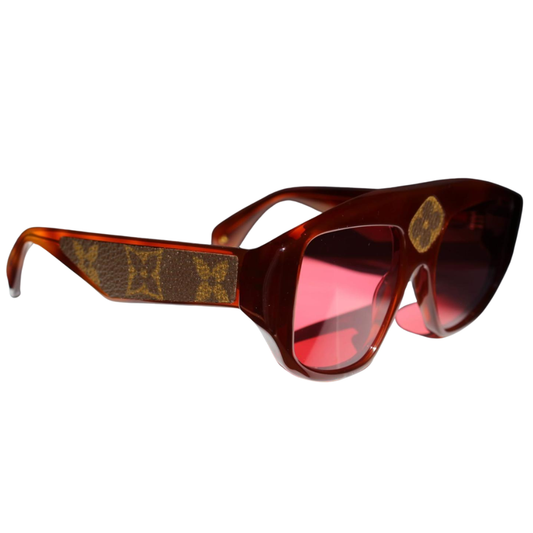 Side profile of Clarissa Oliverio Michelangelo frames featuring original LV leather detail – luxury custom eyewear