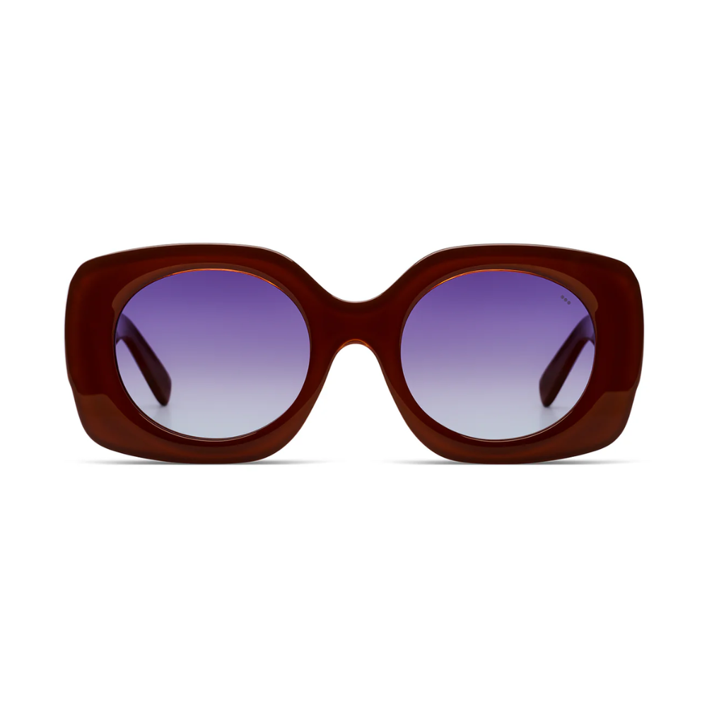 Komono Mariah Amber sunglasses - front view showing classic frame design with warm amber finish
