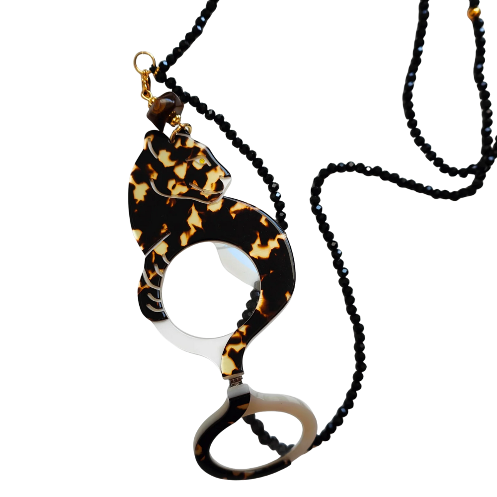 FLIPPAN'LOOK Leopard statement reading glasses - angled view highlighting unique two-layer acetate construction and natural stone chain
