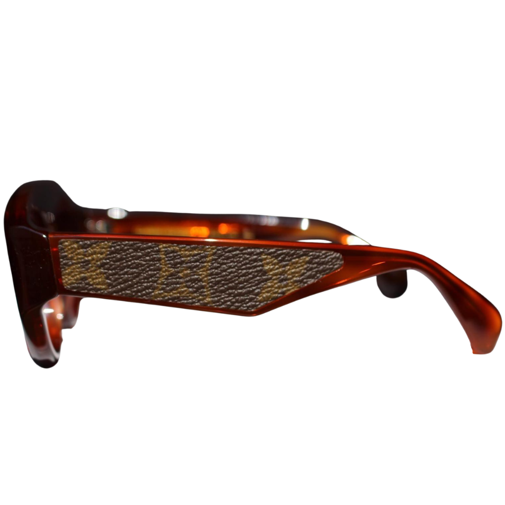 Side profile of Clarissa Oliverio Michelangelo frames featuring original LV leather detail – luxury custom eyewear
