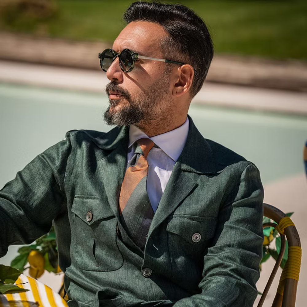 ETERNO NAPOLI Elton Limited Edition – side view of Mazzucchelli M49 bio acetate oval frames, UPN beam-inspired hinge running through the front piece, gradient green lens, 60 handcrafted steps, made in Italy
