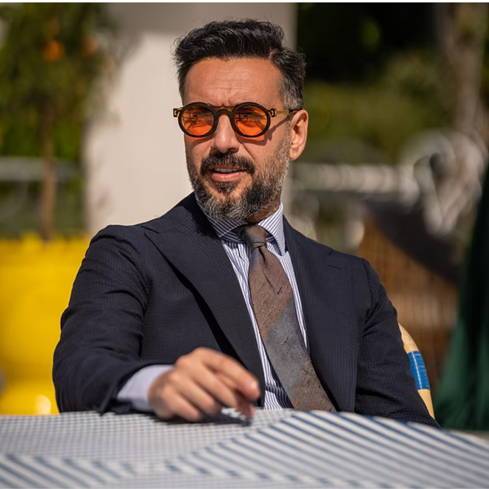 ETERNO NAPOLI Elton Limited Edition – side view of Mazzucchelli M49 bio acetate oval frames in burnt umber, UPN beam-inspired hinge, orange lens GE010, 60 handcrafted steps, made in Italy
