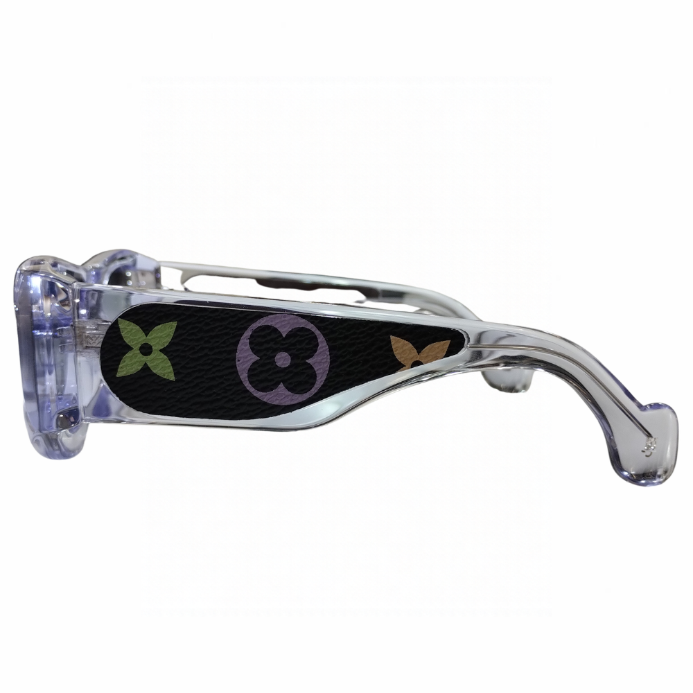 Clarissa Oliverio Mash-Up No. 02 sunglasses, side view of the translucent acetate temple with black leather and multicoloured floral monogram motifs.
