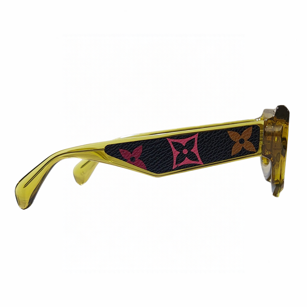 Clarissa Oliverio San Lorenzo Mash-Up LV sunglasses, side view showing a black leather temple insert with pink and orange floral monogram motifs.
