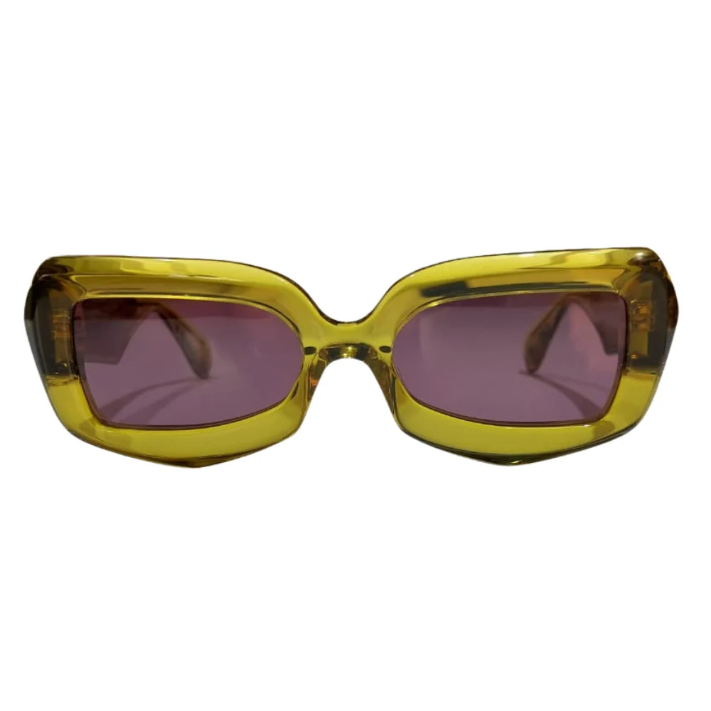Clarissa Oliverio San Lorenzo Mash-Up LV sunglasses, front view with a sculpted translucent yellow acetate frame and purple-tinted lenses.
