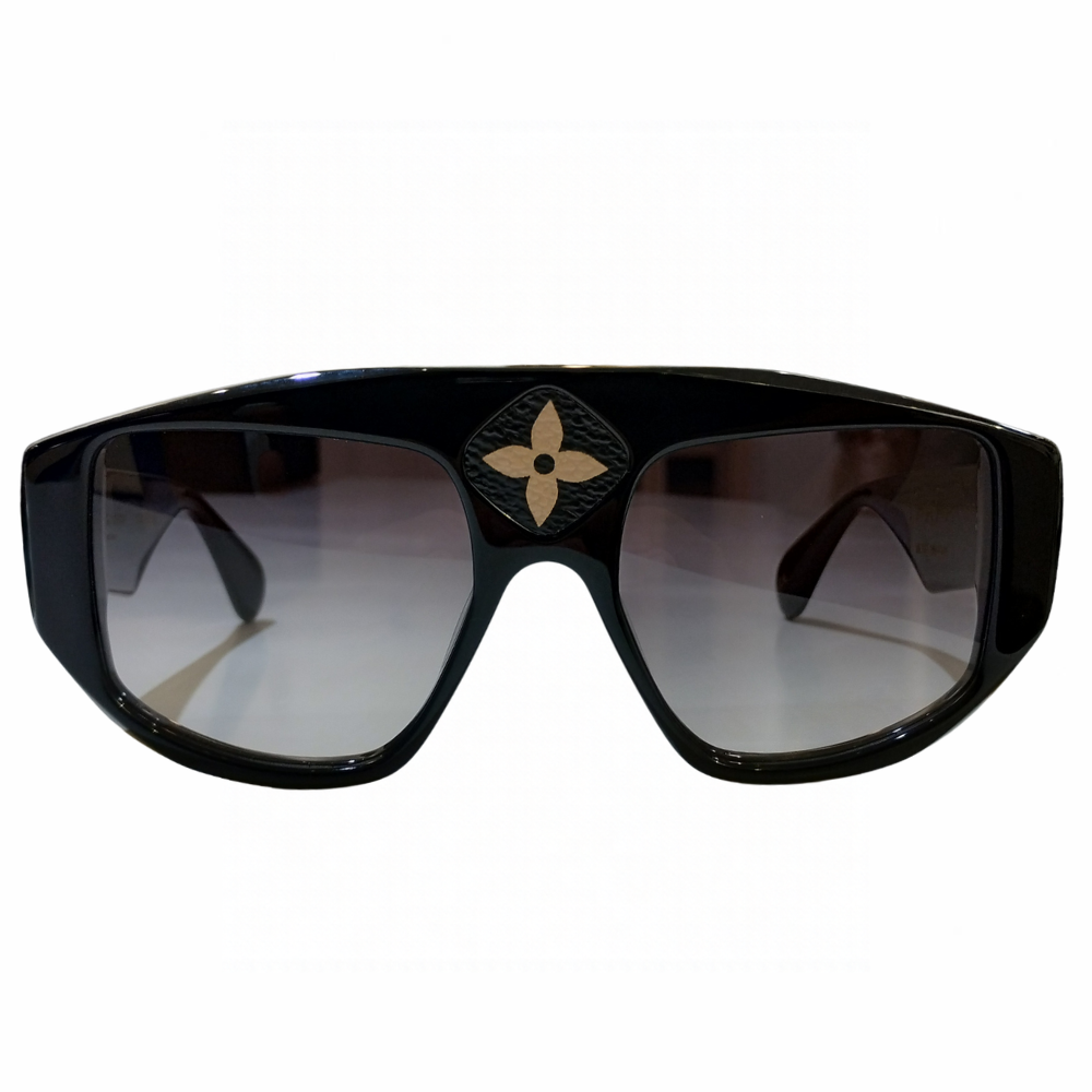 Clarissa Oliverio Michelangelo Mash-Up sunglasses, front view with a black acetate frame, grey gradient lenses and a floral monogram leather detail above the bridge.
