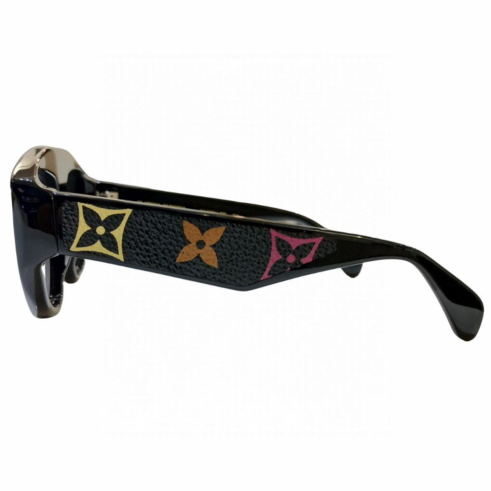 Clarissa Oliverio Michelangelo Mash-Up sunglasses, side view showing a black leather temple insert with yellow, orange and pink floral monogram motifs.
