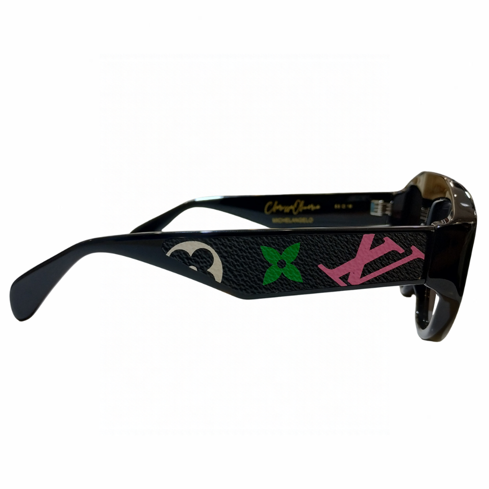 Clarissa Oliverio Michelangelo Mash-Up sunglasses, side view showing a black leather temple insert with a pink LV monogram and green floral motif.

